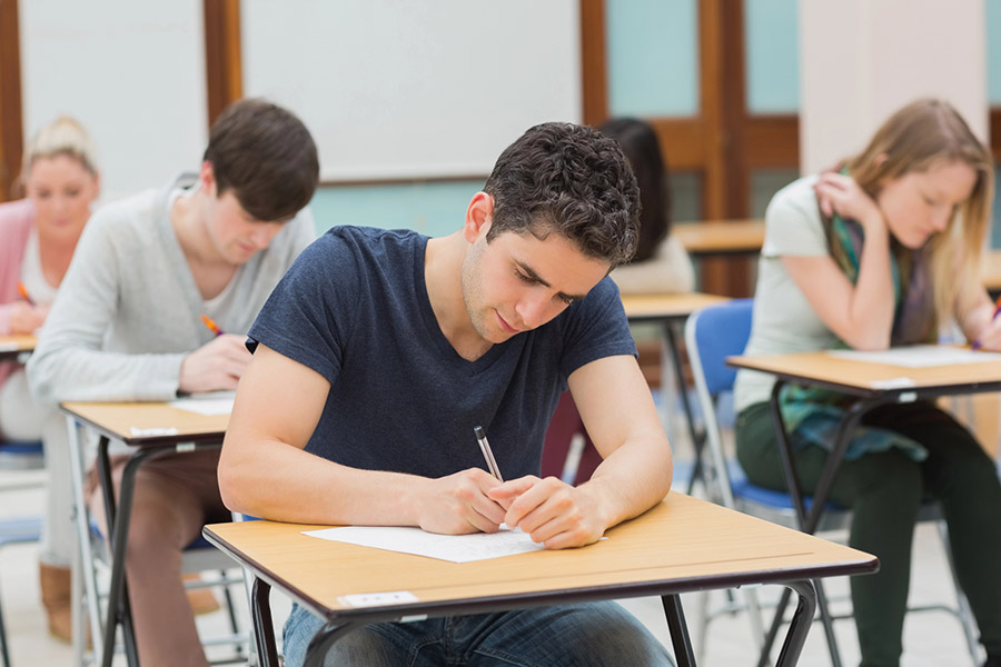 Students taking a test in a classroom in Long Island